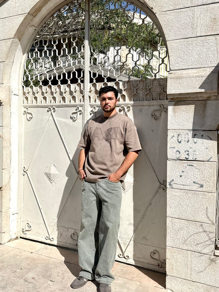 THE ASILI PATCH T-SHIRT IN COFFEE