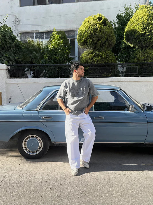 THE ASILI PATCH T-SHIRT IN WASHED GREY