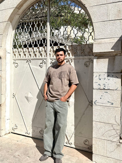 THE ASILI PATCH T-SHIRT IN COFFEE