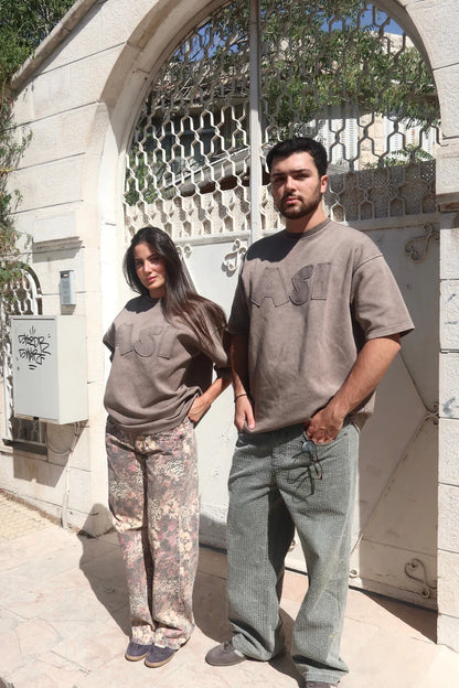 THE ASILI PATCH T-SHIRT IN COFFEE