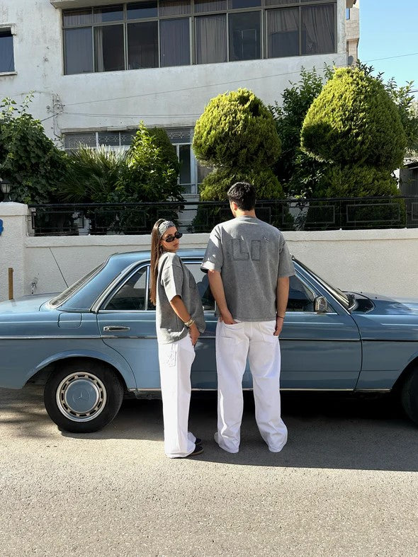 THE ASILI PATCH T-SHIRT IN WASHED GREY