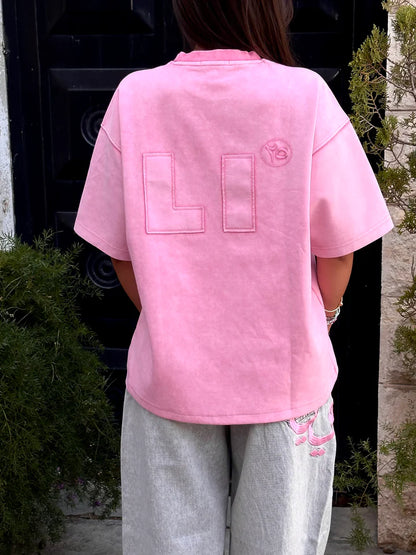 THE ASILI PATCH T-SHIRT IN BUBBLEGUM